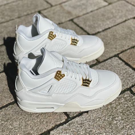 jordan 4 zwart goud